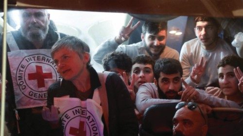 Released Palestinian prisoners react in a vehicle as they leave the Israeli military prison, Ofer, ... Released Palestinian prisoners react in a vehicle as they leave the Israeli military prison, Ofer, ...