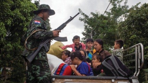 A member of the insurgent KNDF Karenni Nationalities Defence Force rescues civilians trapped amid ... A member of the insurgent KNDF Karenni Nationalities Defence Force rescues civilians trapped amid ...
