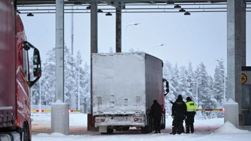 Border guards and a customs official check a truck at the Raja-Jooseppi international border ... Border guards and a customs official check a truck at the Raja-Jooseppi international border ...