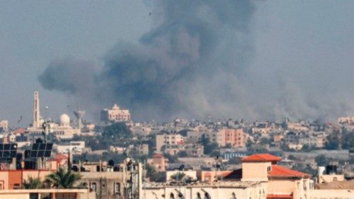 Smoke rises following Israeli strikes in Khan Yunis in the southern Gaza Strip, on December 4, 2023, ...