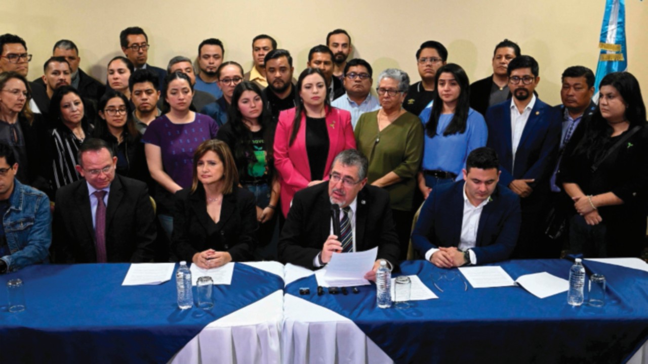 Guatemalan President-elect Bernardo Arevalo (C) speaks during a press conference in Guatemala City ...