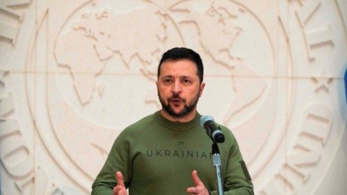 TOPSHOT - Ukrainian President Volodymyr Zelensky speaks to the press after he met with International ... TOPSHOT - Ukrainian President Volodymyr Zelensky speaks to the press after he met with International ...
