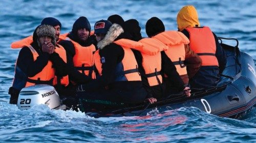 (FILES) Migrants travel in an inflatable boat across the English Channel, bound for Dover on the ... (FILES) Migrants travel in an inflatable boat across the English Channel, bound for Dover on the ...