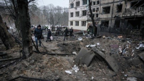 epa11026126 Police officers inspect the site of a damaged residential building following a missile ... epa11026126 Police officers inspect the site of a damaged residential building following a missile ...