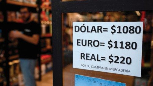 A sign with exchange currency values of the unofficial so-called 'Blue Dollar' of the parallel ...