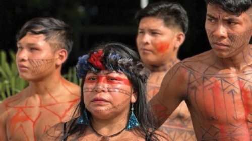 Indigenous protesters block the entrance to a public hearing on the construction of a railway that ... Indigenous protesters block the entrance to a public hearing on the construction of a railway that ...