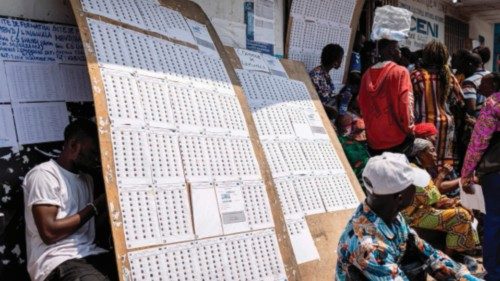 People wait for their voters cards at the Independent National Electoral Commission (CENI) offices ... People wait for their voters cards at the Independent National Electoral Commission (CENI) offices ...