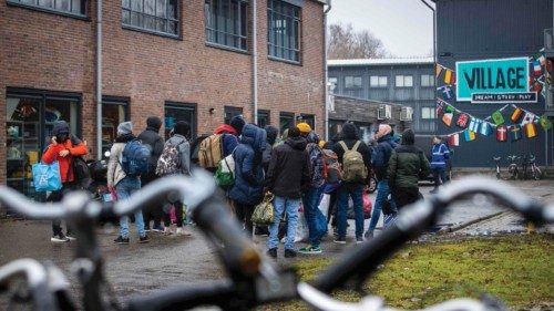 Asylum seekers from the AZC in Ter Apel arrive at the crisis shelter for asylum seekers in the ...