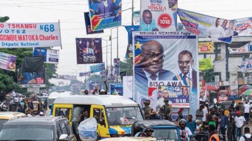 epa11036148 Electoral posters are displayed in the streets of Kinshasa, Democratic Republic of ...