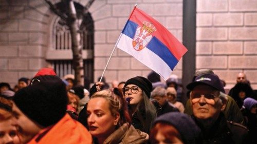 Protestors wave the national flag of Serbia as they attend a demonstration outside the Electoral ... Protestors wave the national flag of Serbia as they attend a demonstration outside the Electoral ...