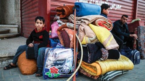 Residents of the refugee camp of Bureij arrive in Deir al-Balah in the central Gaza Strip following ... Residents of the refugee camp of Bureij arrive in Deir al-Balah in the central Gaza Strip following ...
