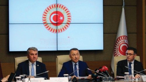 Grand National Assembly of Turkey (TBMM)'s Foreign Affairs Committee's Fuat Oktay (C) chairs a ...