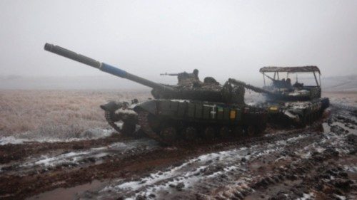 Ukrainian tank crews take part in a drill not far from the front line in the Bakhmut direction, in ...