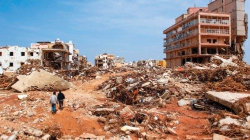 -- AFP PICTURES OF THE YEAR 2023 --
Men walk past debris of buildings caused by flash floods in ... -- AFP PICTURES OF THE YEAR 2023 --
Men walk past debris of buildings caused by flash floods in ...