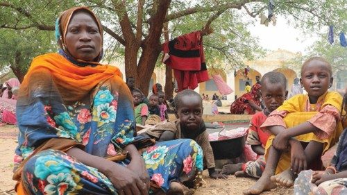On 17 June 2023, Sudanese refugee Fatna Ibrahim Daoud, 35, a mother of 7, is sheltering in the shade ... On 17 June 2023, Sudanese refugee Fatna Ibrahim Daoud, 35, a mother of 7, is sheltering in the shade ...