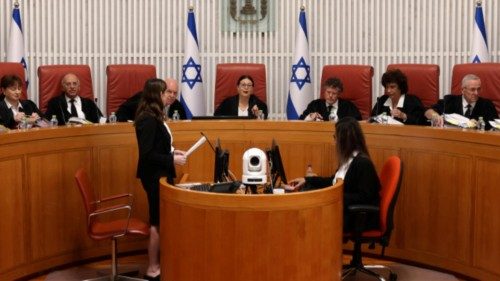 epa11053078 (FILE) President of the Israeli Supreme Court Esther Hayut (C) and judges assemble to ...