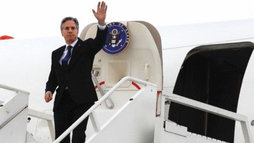 U.S. Secretary of State Antony Blinken waves from the plane as he departs at Felipe Angeles ...