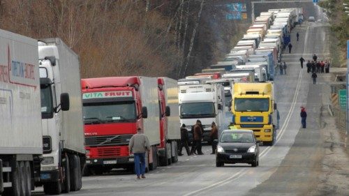 FILE PHOTO: Trucks wait in line on the border crossing between Poland and Ukraine in Korczowa, ...