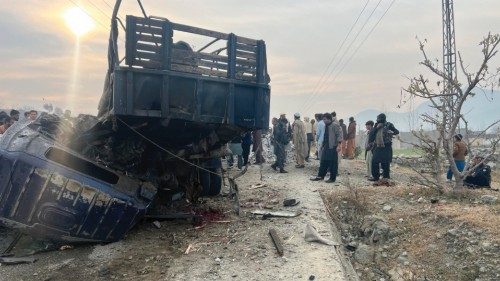 epaselect epa11063942 Pakistani security officials inspect the scene of a bomb blast that targeted ... epaselect epa11063942 Pakistani security officials inspect the scene of a bomb blast that targeted ...