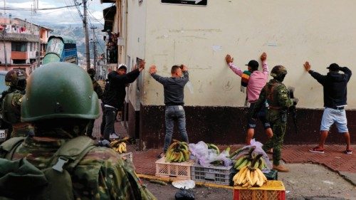 Members of the Armed Forces frisk men during an operation to protect civil security in Quito, on ... Members of the Armed Forces frisk men during an operation to protect civil security in Quito, on ...