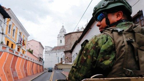 Members of the Armed Forces patrol a street during an operation to protect civil security in Quito, ... Members of the Armed Forces patrol a street during an operation to protect civil security in Quito, ...
