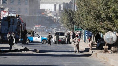 epa11070040 Houthi troopers man a checkpoint during a gathering at the end of a military training, ...
