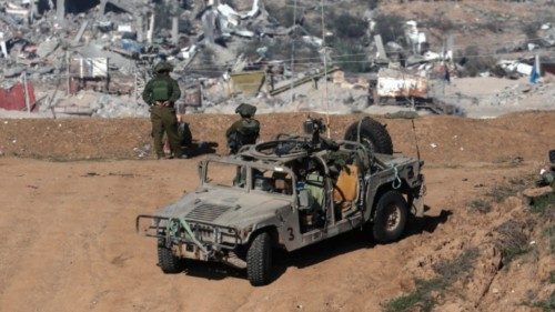 epa11072409 (FILE) - epa11047745 Israeli army soldiers stand guard at a position near the ...
