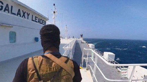 FILE PHOTO: A Houthi fighter stands on the Galaxy Leader cargo ship in the Red Sea in this photo ... FILE PHOTO: A Houthi fighter stands on the Galaxy Leader cargo ship in the Red Sea in this photo ...