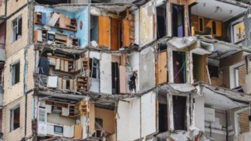 epaselect epa11076573 A view of the ruins of a residential building destroyed in a missile strike on ... epaselect epa11076573 A view of the ruins of a residential building destroyed in a missile strike on ...