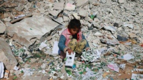 A Palesitinian girl looks for salvageable items amid the destruction on the southern outskirts of ... A Palesitinian girl looks for salvageable items amid the destruction on the southern outskirts of ...