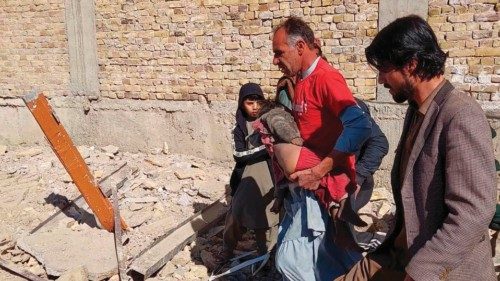 epa11084665 Rescue officials shift an injured child to a hospital after a blast in Quetta, the ...