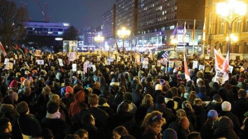 A huge crowd of people with banners and placards against racism and farright politics take part in a ... A huge crowd of people with banners and placards against racism and farright politics take part in a ...