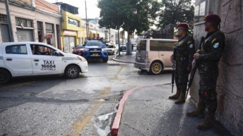 Security forces patrol the surroundings of Constitution Square before an event of Guatemala's new ...