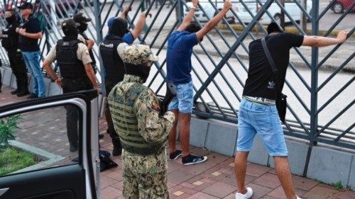 Men suspected of belonging to a criminal gang remain detained during a joint operation between the ...