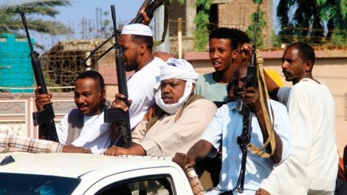 Sudanese members of the Sudanese armed popular resistance, which supports the army, raise their ... Sudanese members of the Sudanese armed popular resistance, which supports the army, raise their ...