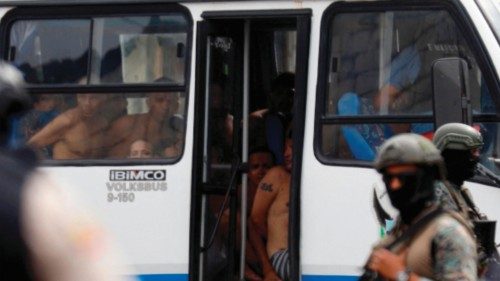 Arrested men who attempted to take over a hospital sit in a police bus in Guayas, Ecuador, on ... Arrested men who attempted to take over a hospital sit in a police bus in Guayas, Ecuador, on ...