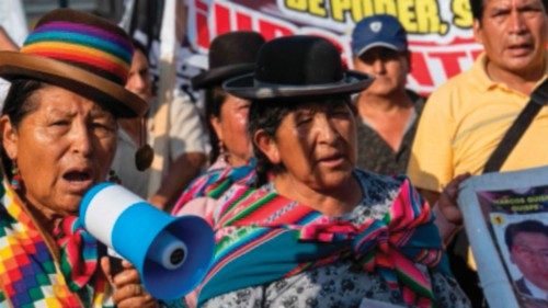 Women in typical Andean attires call slogans against Peruvian President Dina Boluarte during a ... Women in typical Andean attires call slogans against Peruvian President Dina Boluarte during a ...