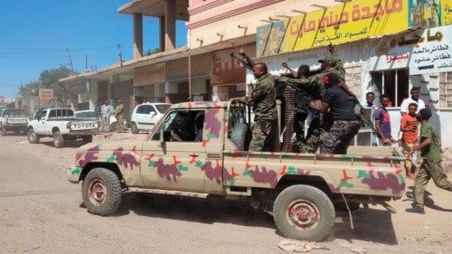 Sudanese soldiers and enroled personnel drive a pick up truck mounted with a machine gun on a street ... Sudanese soldiers and enroled personnel drive a pick up truck mounted with a machine gun on a street ...