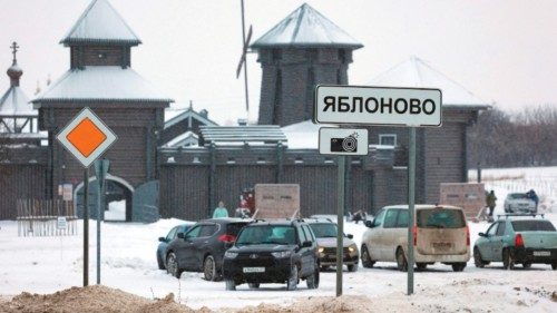 TOPSHOT - A road sign sits in the village of Yablonovo near the Russian IL-76 military transport ... TOPSHOT - A road sign sits in the village of Yablonovo near the Russian IL-76 military transport ...