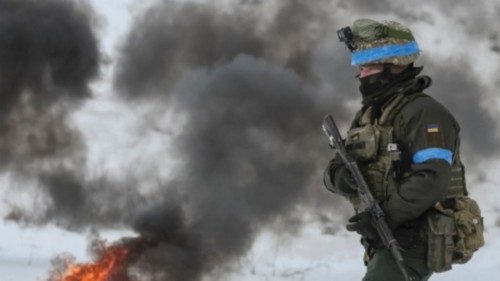 A Ukrainian serviceman attends mock anti-sabotage drills near the border with Russia, amid Russia's ...