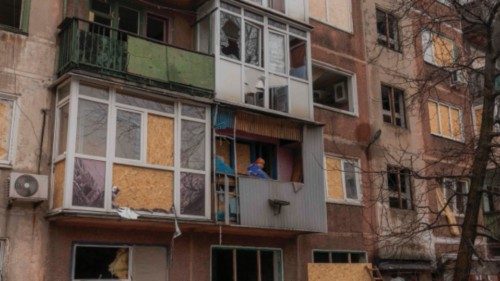TOPSHOT - An elderly woman stands inside her damaged apartment following an overnight shelling in ... TOPSHOT - An elderly woman stands inside her damaged apartment following an overnight shelling in ...