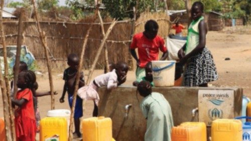 Sudanese refugees collect water from a borehole at the Gorom Refugee camp hosting Sudanese refugees ...