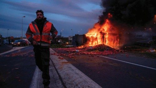 TOPSHOT - Smoke billows from a burning truck during a protest against taxation and declining income, ... TOPSHOT - Smoke billows from a burning truck during a protest against taxation and declining income, ...