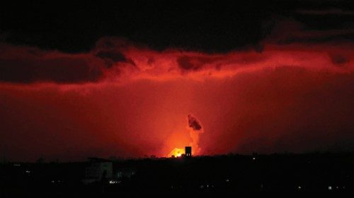 TOPSHOT - Smoke and flames rise in Rafah in the southern Gaza Strip during Israeli bombardment on ...