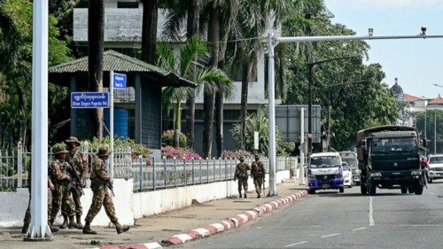 Members of the Myanmar?s military security force patrol a street during a 'silent strike' to protest ...