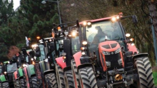 Farmers drive their tractors in front of the prefecture of Rennes, western France, on February 1, ... Farmers drive their tractors in front of the prefecture of Rennes, western France, on February 1, ...