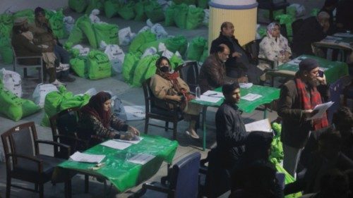 Members of the election commission work to distribute materials for the general election in Lahore, ... Members of the election commission work to distribute materials for the general election in Lahore, ...