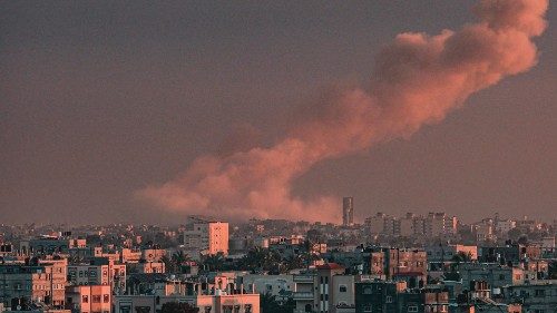 TOPSHOT - A picture taken from Rafah in the southern Gaza Strip shows smoke rising over buildings in ... TOPSHOT - A picture taken from Rafah in the southern Gaza Strip shows smoke rising over buildings in ...