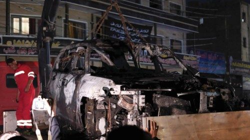epa11135161 Iraqi security forces remove a burnt out truck that was targeted by a US drone strike at ... epa11135161 Iraqi security forces remove a burnt out truck that was targeted by a US drone strike at ...