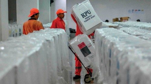 TOPSHOT - Officials transport ballot boxes for distribution to polling places in Jakarta on February ... TOPSHOT - Officials transport ballot boxes for distribution to polling places in Jakarta on February ...